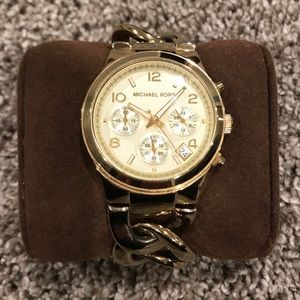 Michael Kors gold link women's watch.